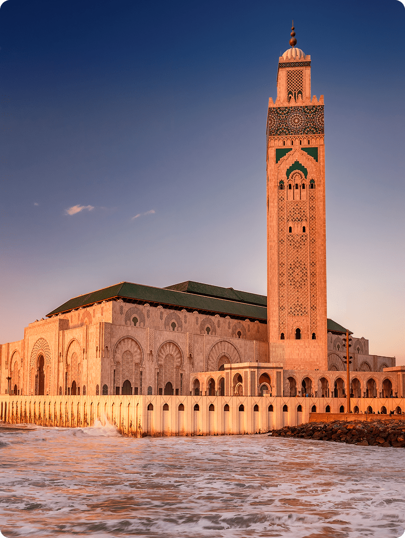 Oceanfront mosque with tall minaret