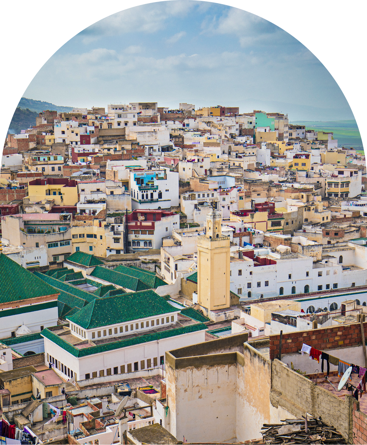 Urban landscape with diverse architecture and minaret